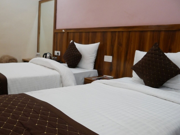 Imagen de la habitación del Hotel AyushMan Inn. Foto 12