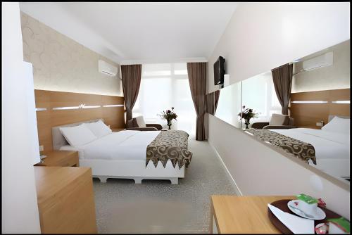 Imagen de la habitación del Hotel Ayvacık Restaurant. Foto 17