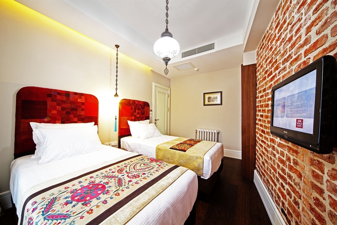 Imagen de la habitación del Hotel Azade Suites. Foto 3