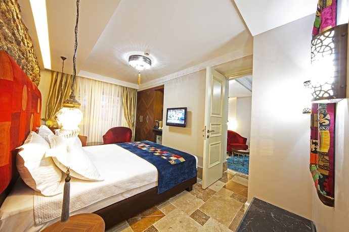 Imagen de la habitación del Hotel Azade Suites. Foto 4