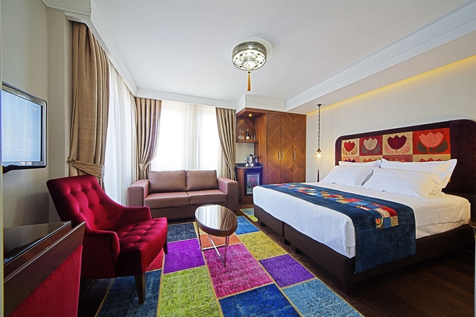 Imagen de la habitación del Hotel Azade Suites. Foto 5