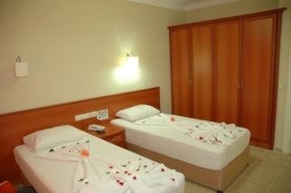 Imagen de la habitación del Hotel Azalea Apart Hotel. Foto 4