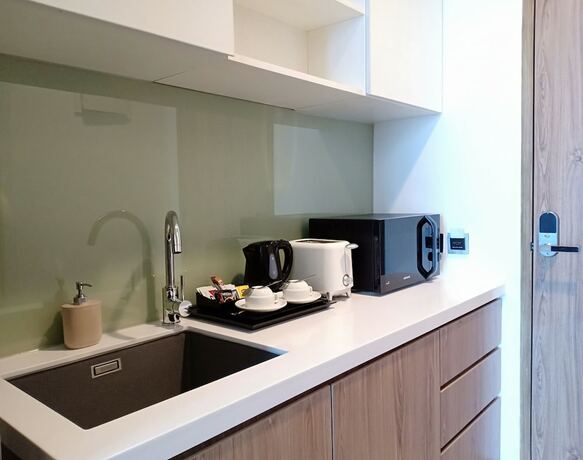 Imagen de la habitación del Hotel Azana Suite Hotel Antasari. Foto 16