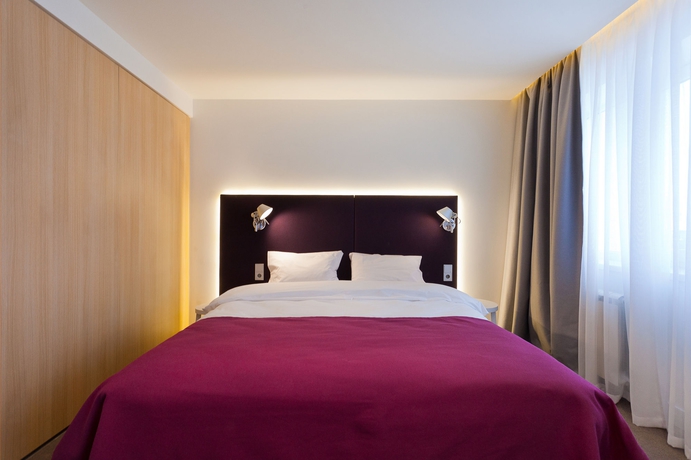 Imagen de la habitación del Hotel Azimut Vladivostok. Foto 2