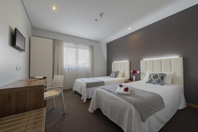 Imagen de la habitación del Hotel Azinheira by RIDAN Hotels. Foto 2