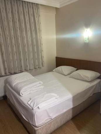 Imagen de la habitación del Hotel Azizoglu Malkoc. Foto 11