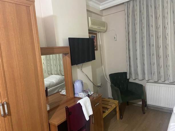 Imagen de la habitación del Hotel Azizoglu Malkoc. Foto 12