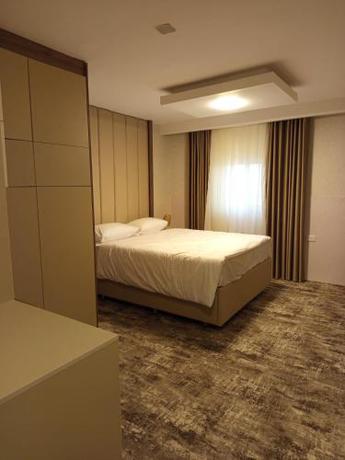 Imagen de la habitación del Hotel Azmal & Suites. Foto 17