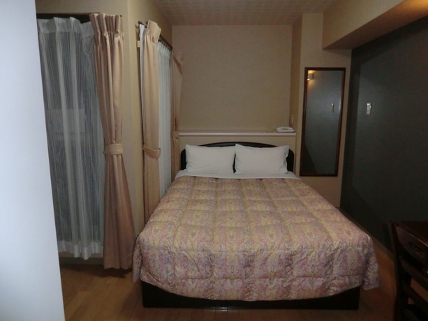 Imagen de la habitación del Hotel Azu Garden Nipponbashi. Foto 5