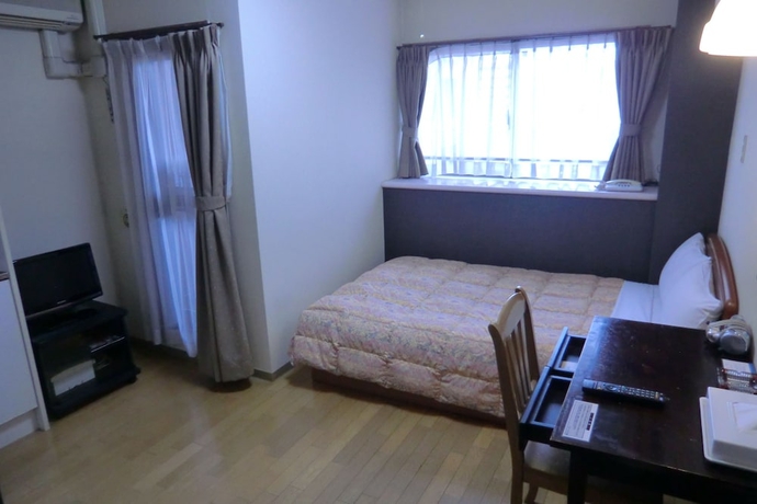 Imagen de la habitación del Hotel Azu Garden Nipponbashi. Foto 11