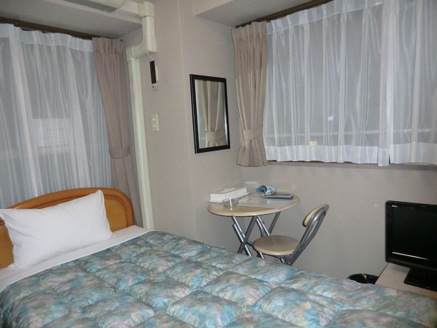 Imagen de la habitación del Hotel Azu Garden Nipponbashi. Foto 15