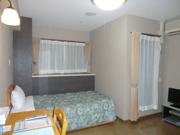 Imagen de la habitación del Hotel Azu Garden Nipponbashi. Foto 17