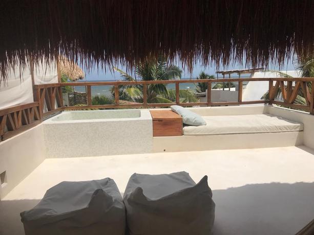 Imagen de la habitación del Hotel Azucar Tulum. Foto 10