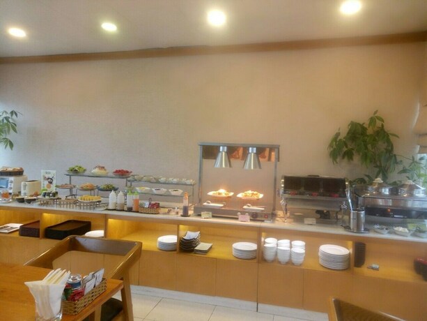 Imagen del bar/restaurante del Hotel Azumaya Hai Ba Trung 1. Foto 20