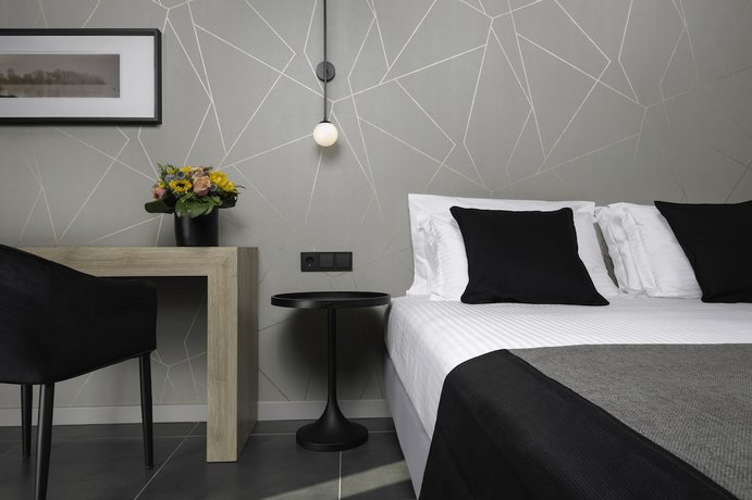 Imagen de la habitación del Hotel Azur Suites. Foto 5