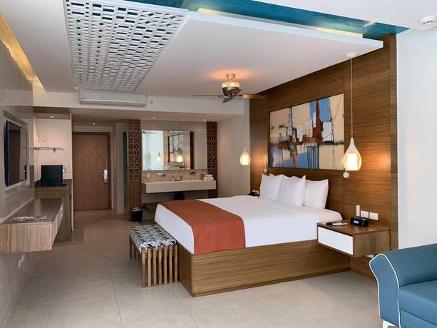 Imagen de la habitación del Hotel Azura Beach Resort - All Inclusive - Adults Only. Foto 11