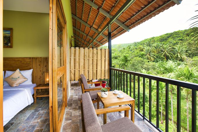 Imagen de la habitación del Hotel Azura Phu Quoc Resort. Foto 14