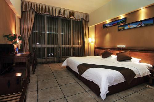 Imagen de la habitación del Hotel Azure Bay Resort. Foto 6