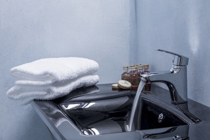 Imagen de la habitación del Hotel Azzurro Suites. Foto 6