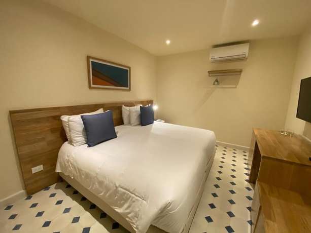 Imagen de la habitación del Hotel B HAUS HOTEL BOUTIQUE. Foto 6