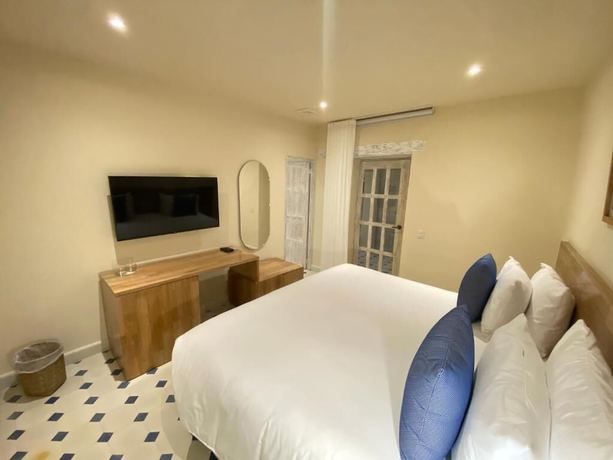 Imagen de la habitación del Hotel B HAUS HOTEL BOUTIQUE. Foto 8
