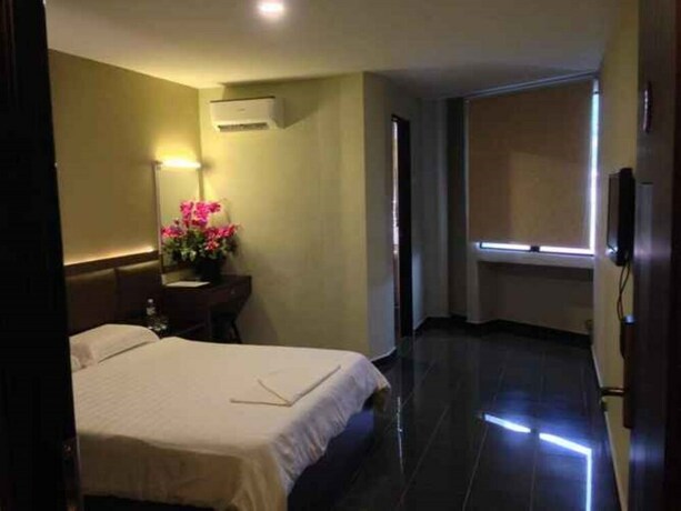 Imagen de la habitación del Hotel B+ Hotel. Foto 20