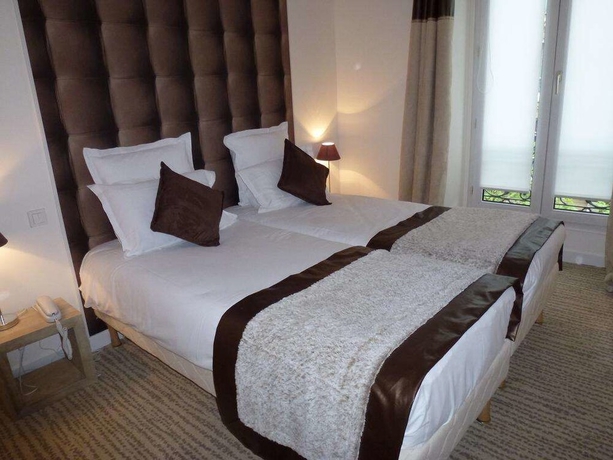 Imagen de la habitación del Hotel B Square. Foto 15