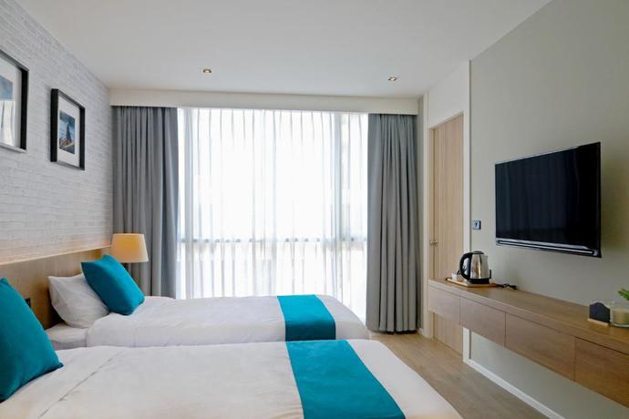Imagen de la habitación del Hotel B Stay, Bangkok. Foto 10