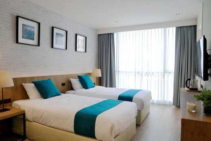 Imagen de la habitación del Hotel B Stay, Bangkok. Foto 13