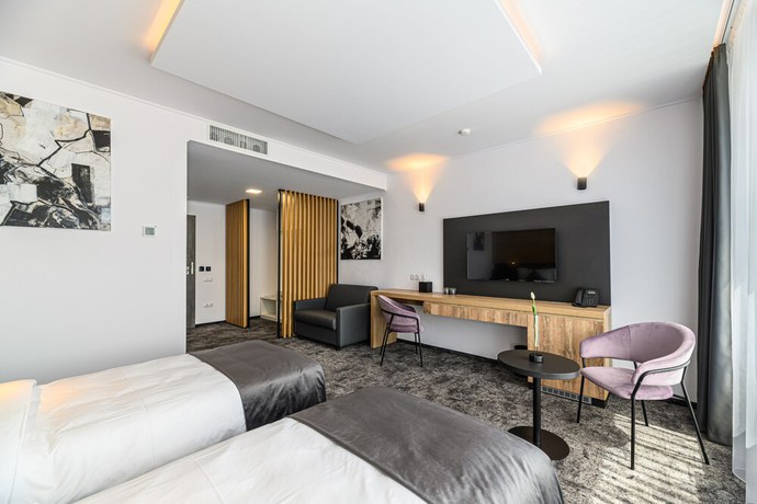 Imagen de la habitación del Hotel B THE HOTEL. Foto 5