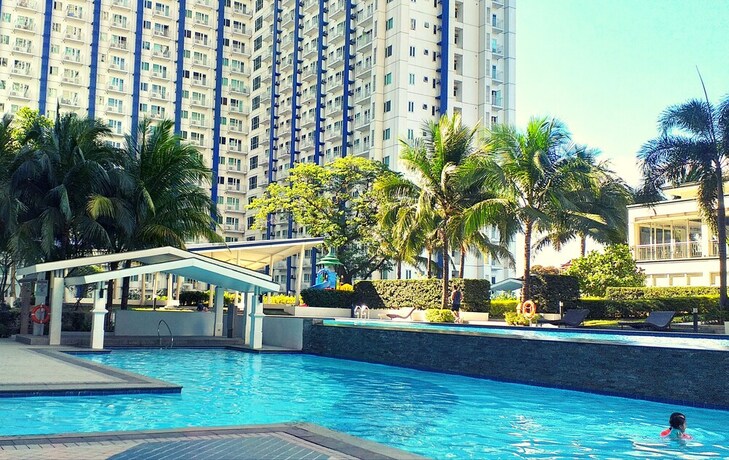 Imagen de la piscina del Hotel B and B at Grass Residence SM North. Foto 37