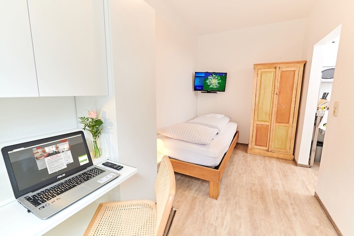 Imagen de la habitación del Hotel B and L. Foto 6