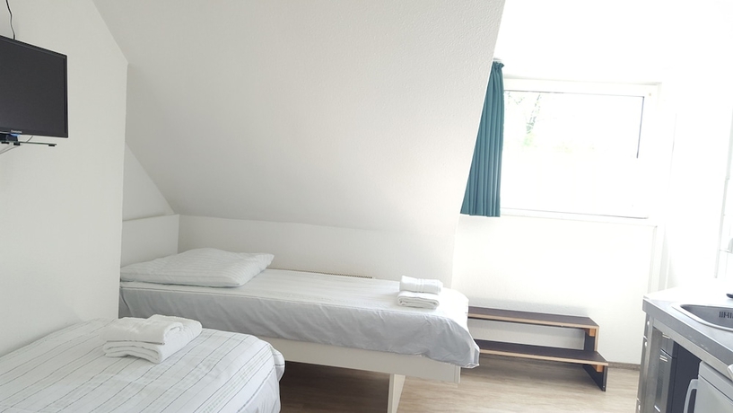 Imagen de la habitación del Hotel B and L. Foto 11