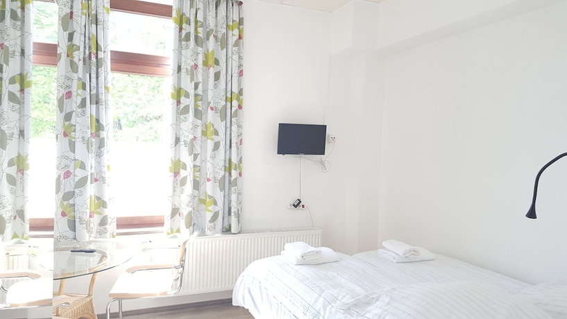 Imagen de la habitación del Hotel B and L. Foto 19