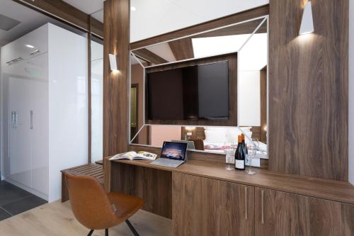 Imagen de la habitación del Hotel B1 Boutique Sofia. Foto 18