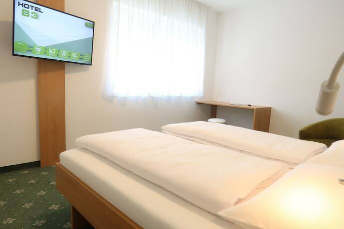 Imagen de la habitación del Hotel B3. Foto 18