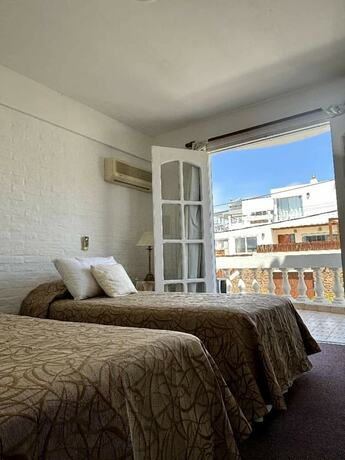 Imagen de la habitación del Hotel BAGU VILLA DE MAR. Foto 14