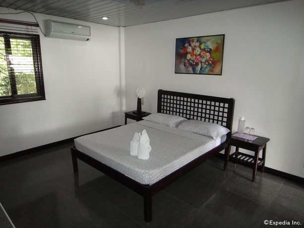 Imagen de la habitación del Hotel BALAY TUKO GARDEN INN. Foto 7