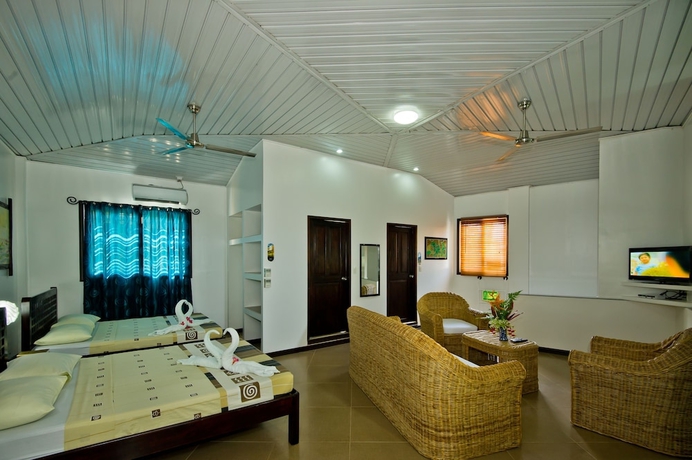 Imagen de la habitación del Hotel BALAY TUKO GARDEN INN. Foto 8