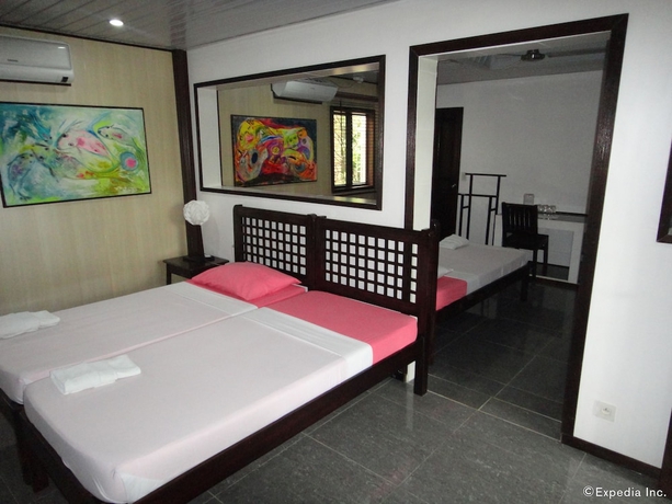 Imagen de la habitación del Hotel BALAY TUKO GARDEN INN. Foto 11