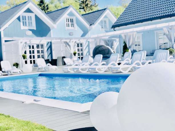 Imagen de la piscina del Hotel BALTIC FAMILY cottages Swimming pool Kids Club Bicycles. Foto 17