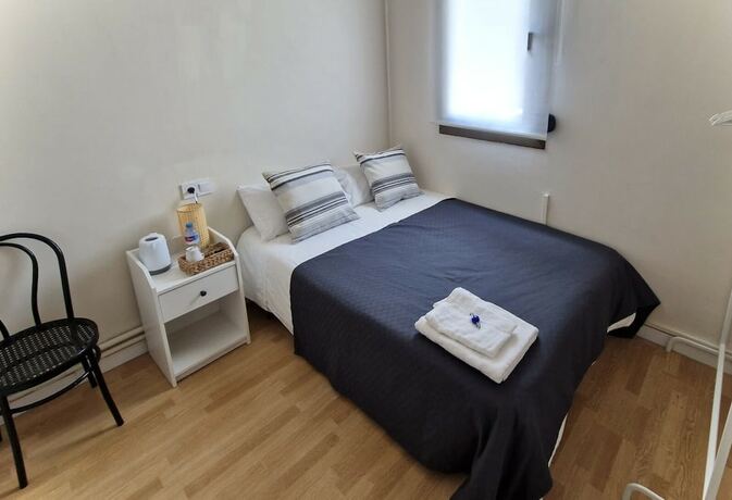 Imagen de la habitación del Hotel BARCELONA PR GUESTHOUSE. Foto 7