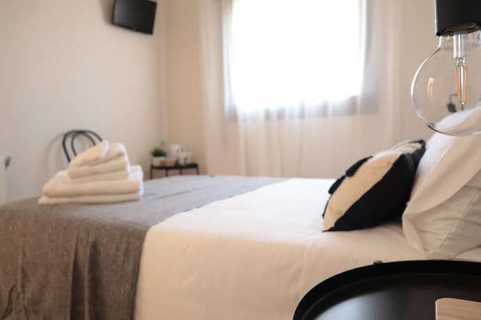 Imagen de la habitación del Hotel BARCELONA PR GUESTHOUSE. Foto 8