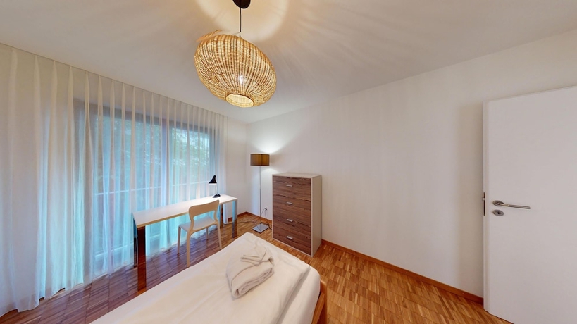 Imagen de la habitación del Hotel BASELLODGING Sch&ouml;nau Serviced Living. Foto 11