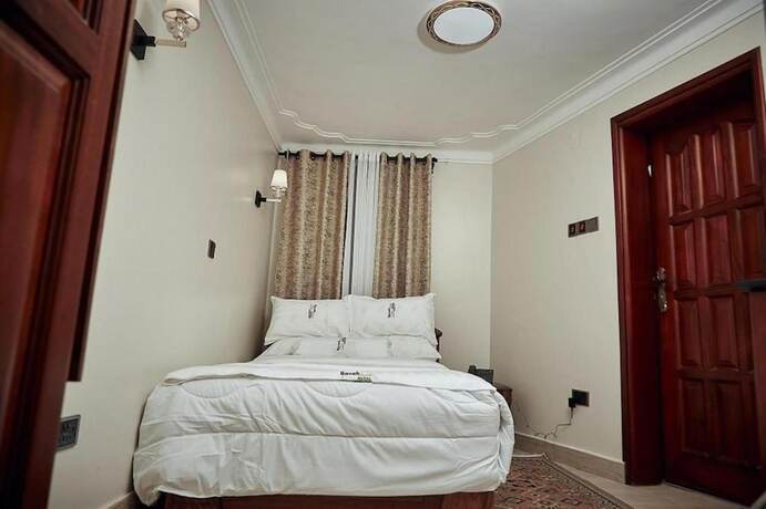 Imagen de la habitación del Hotel BAVAH AIRPORT HOTEL. Foto 11