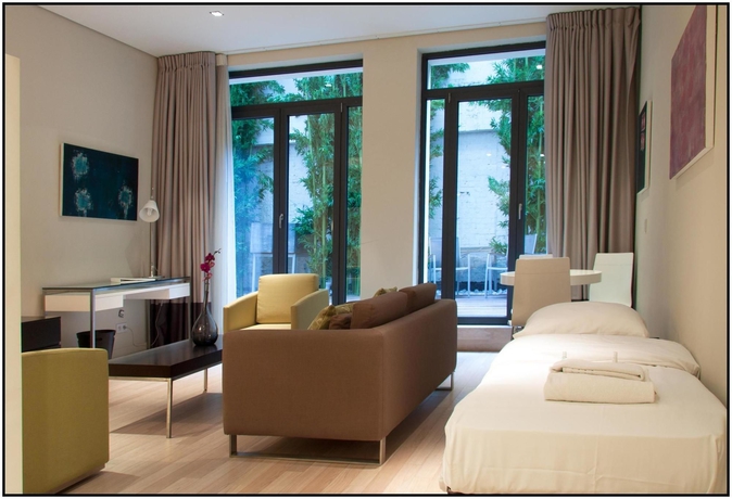 Imagen de la habitación del Hotel B-Aparthotels Grand Place. Foto 8