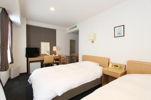 Imagen de la habitación del Hotel BB fast Yonezawa. Foto 17