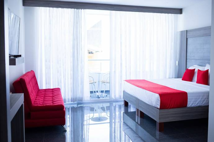 Imagen de la habitación del Hotel BE Suites Cali. Foto 3