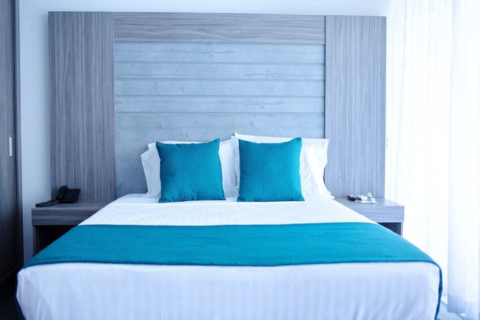 Imagen de la habitación del Hotel BE Suites Cali. Foto 4
