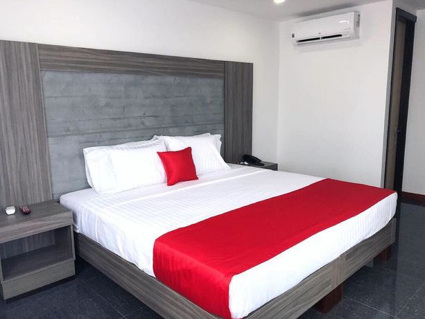 Imagen de la habitación del Hotel BE Suites Cali. Foto 6